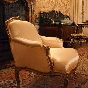 white upholstered chair in lobby